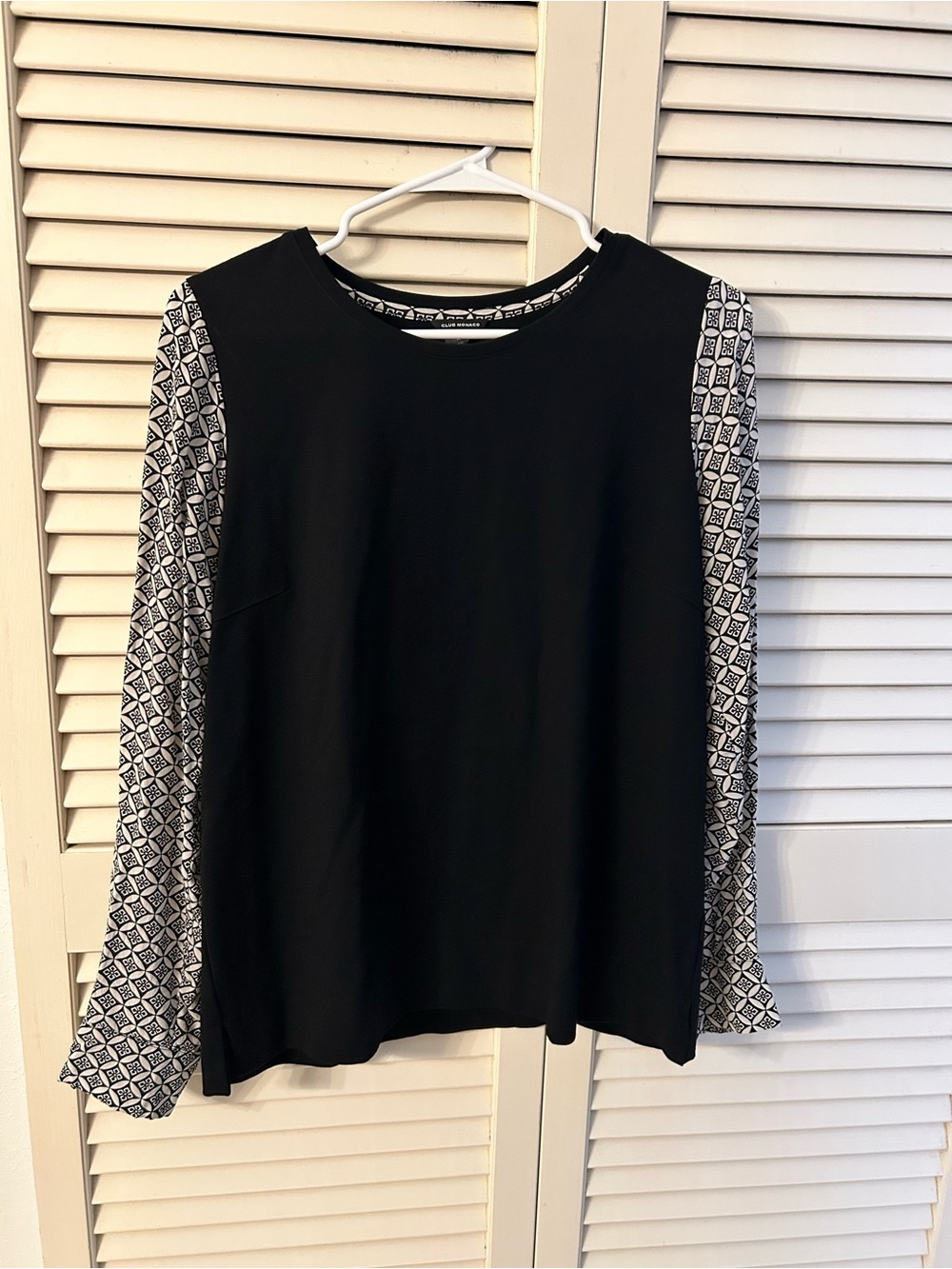 Club Monaco  knit Black Top with Geometric-Print Long Sleeves